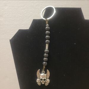 Silver and Black Lava Beaded Key Chain With a Skull Charm